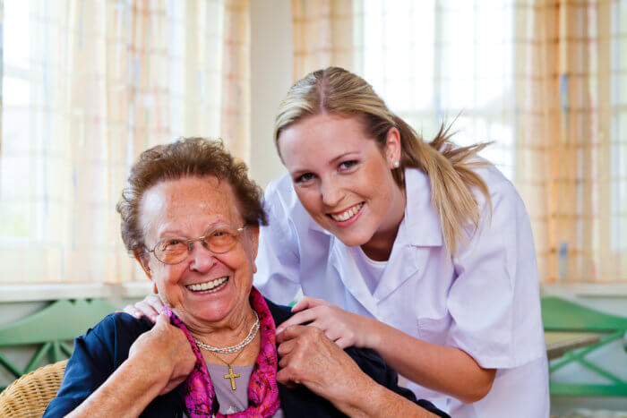 a senior woman and her nurse