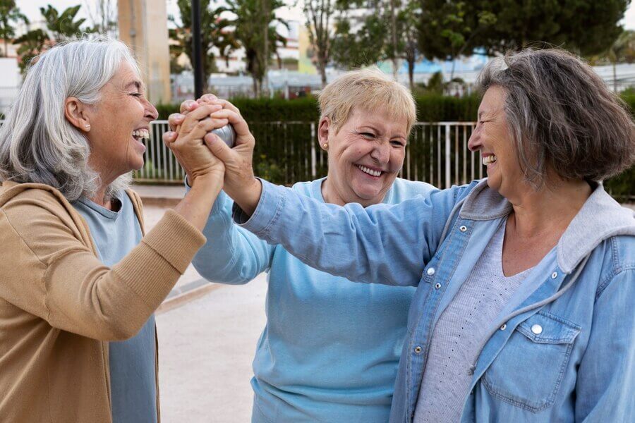 elderly friends happily participating in active retirement communities