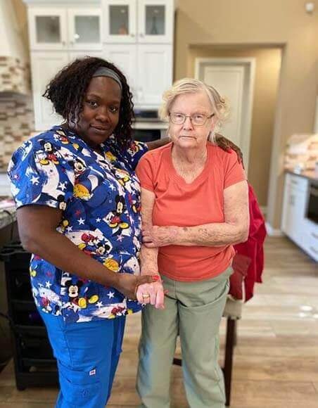 Caregiver assisting senior